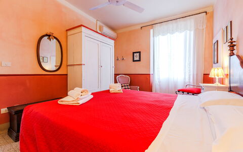 Logement Rossello: chambre à coucher