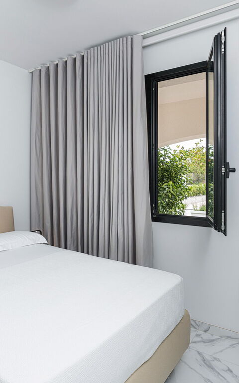 Villa Hermes: chambre à coucher