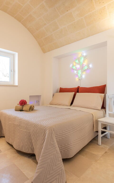 Trullo Adea: chambre à coucher