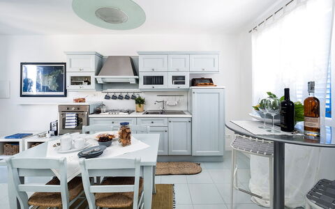 Logement Delfino: Cuisine, Salle à manger, Salon