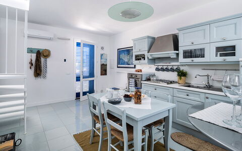 Logement Delfino: Cuisine, Salle à manger, Salon