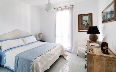 Logement Delfino: chambre à coucher