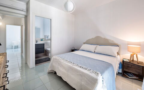 Logement Delfino: chambre à coucher