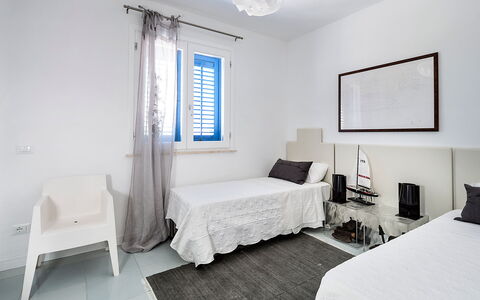 Logement Delfino: chambre à coucher