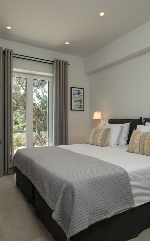 Villa Thea Mare Maistro: chambre à coucher