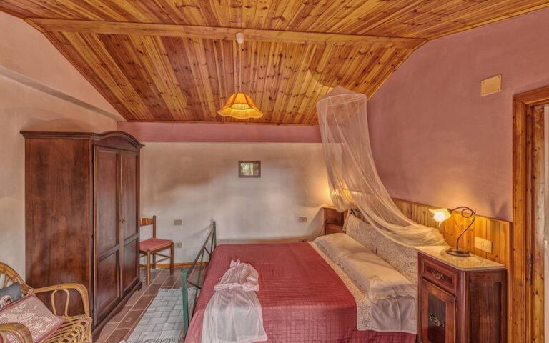 Logement Leccino 4: chambre à coucher