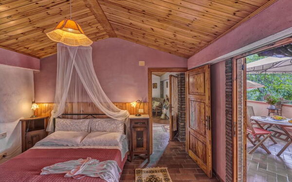 Logement Leccino 4: chambre à coucher