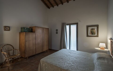 Logement Catola: chambre à coucher