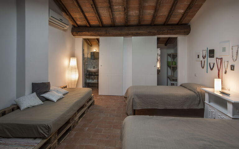 Logement Catola: chambre à coucher