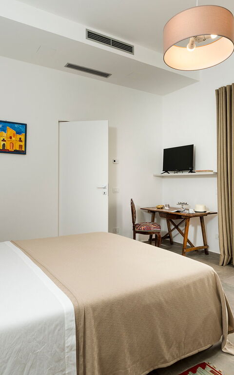 Villa Cavalè: chambre à coucher