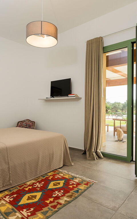 Villa Cavalè: chambre à coucher