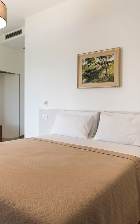 Villa Cavalè: chambre à coucher