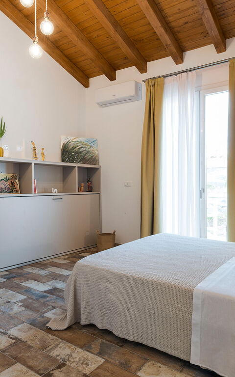 Villa Sike: chambre à coucher