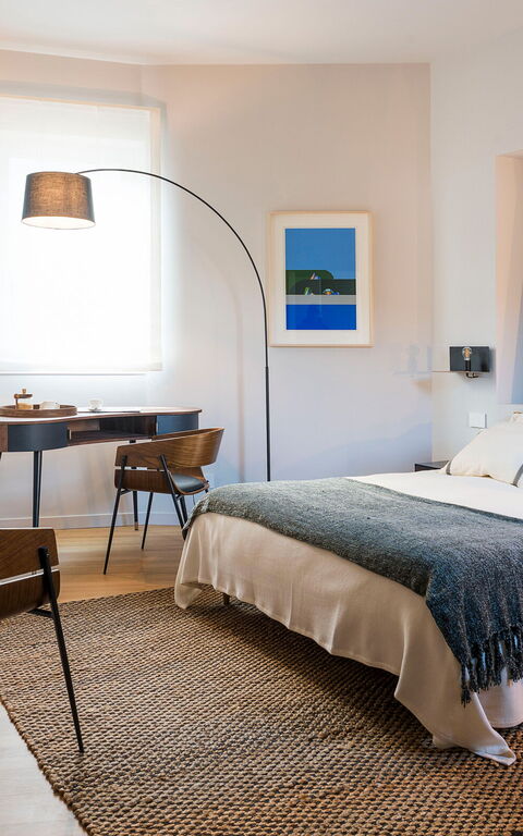 Monumento Apartament: chambre à coucher