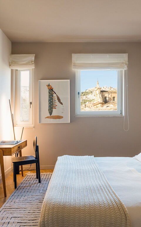 Monumento Apartament: chambre à coucher