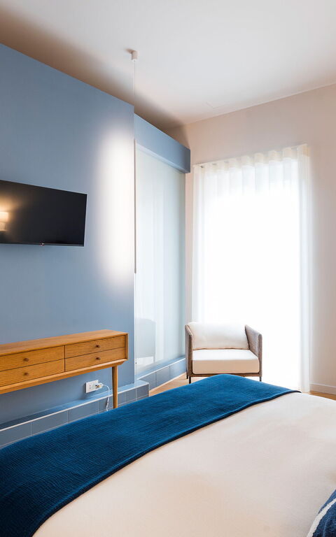 Monumento Apartament: chambre à coucher