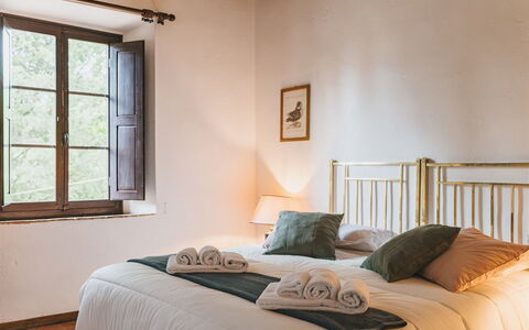 Logement Colonica: chambre à coucher