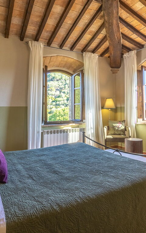 Podere Peteglia: chambre à coucher