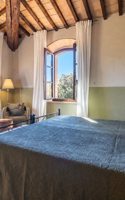 Podere Peteglia: chambre à coucher