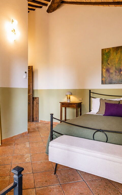 Podere Peteglia: chambre à coucher
