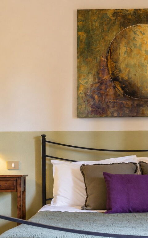 Podere Peteglia: chambre à coucher