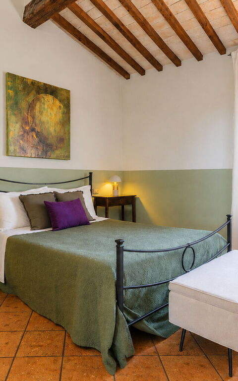 Podere Peteglia: chambre à coucher