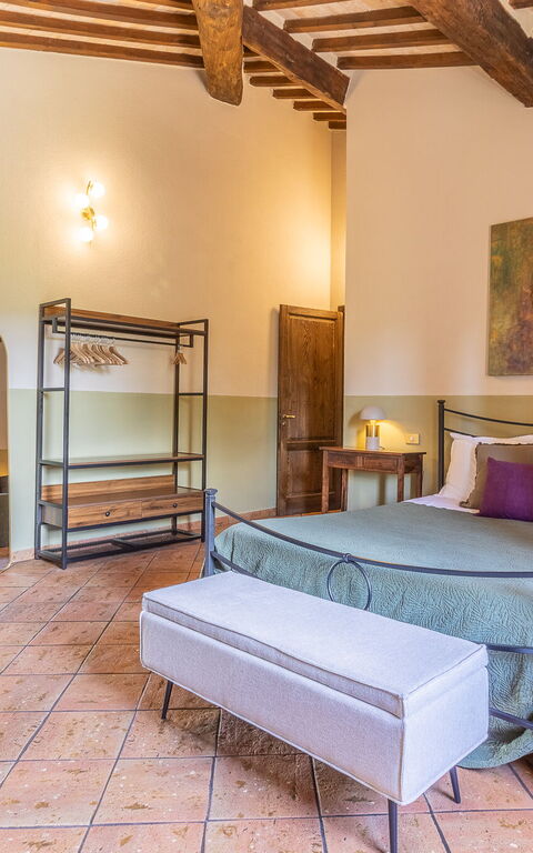 Podere Peteglia: chambre à coucher