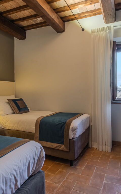 Tenuta Poggio Guiano: chambre à coucher