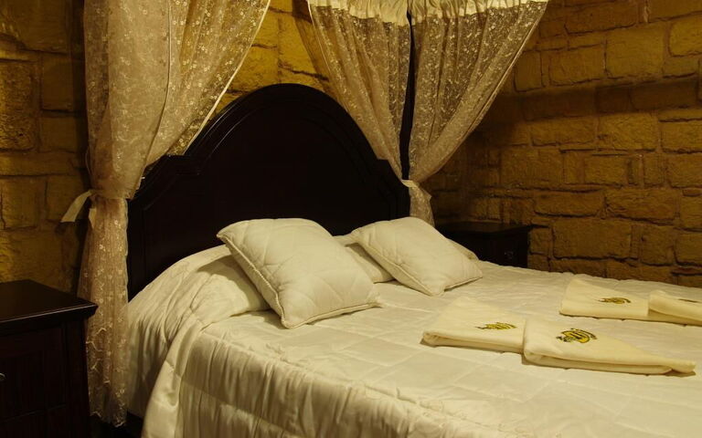 Logement Suite Price Elias: chambre à coucher
