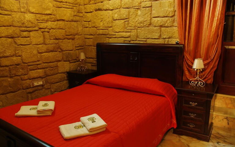 Logement Suite Price Elias: chambre à coucher