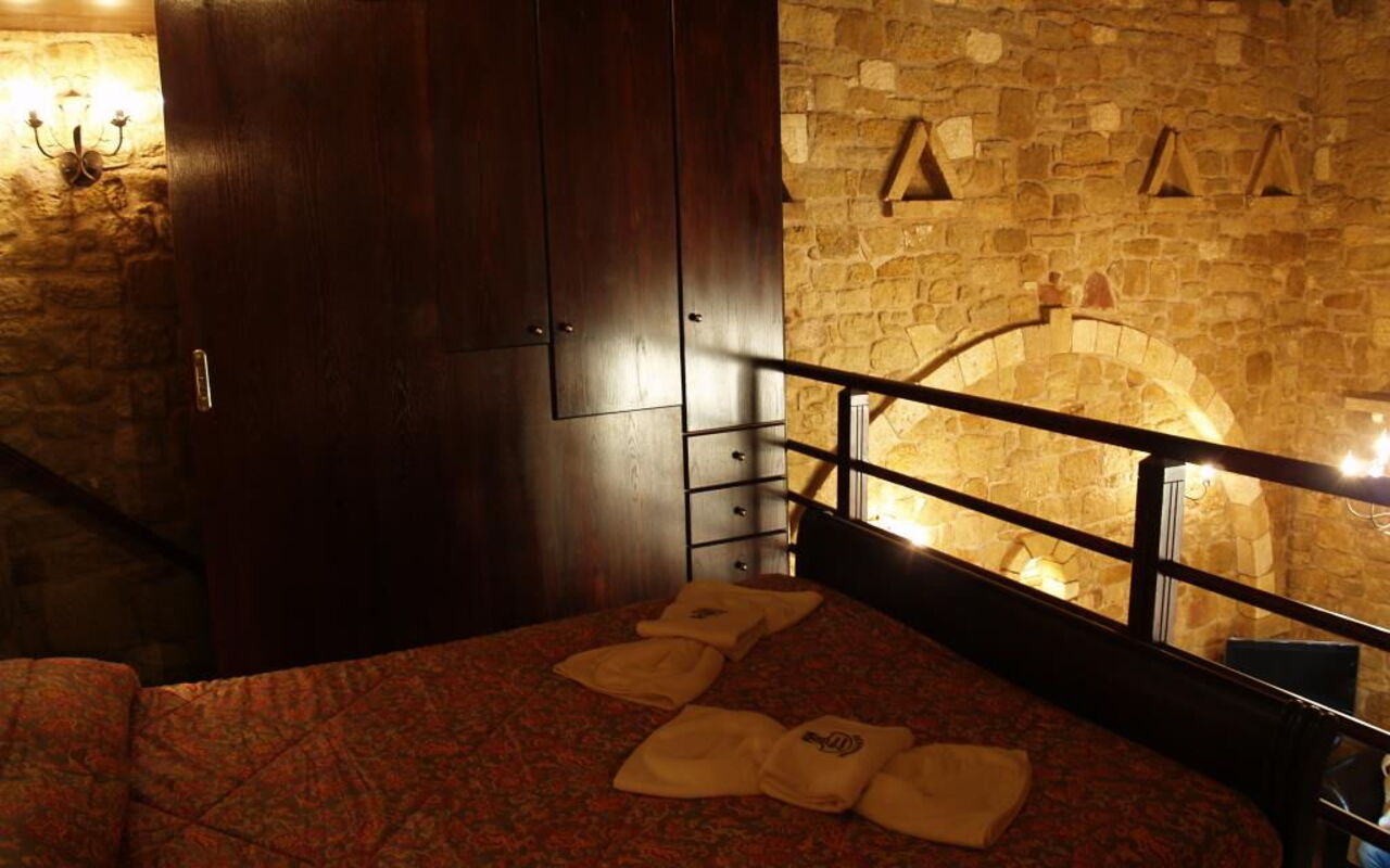 Logement Suite Princess Eleftheria: chambre à coucher