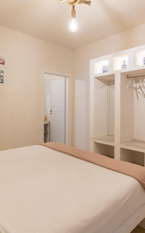 Villa Calanthia: chambre à coucher