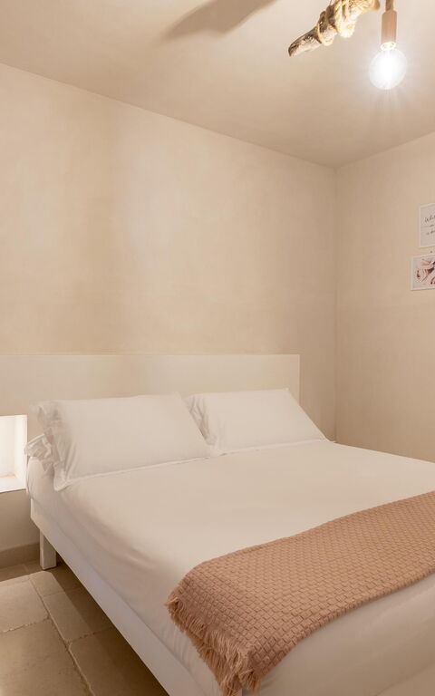 Villa Calanthia: chambre à coucher