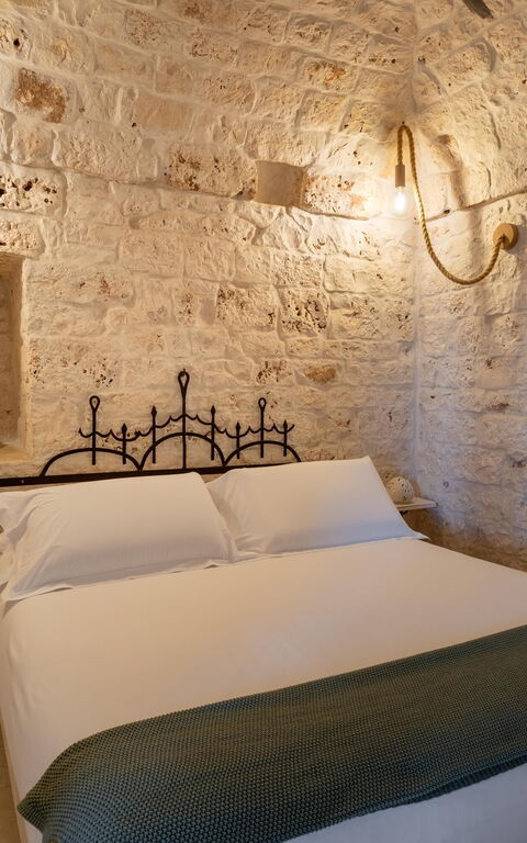Villa Calanthia: chambre à coucher