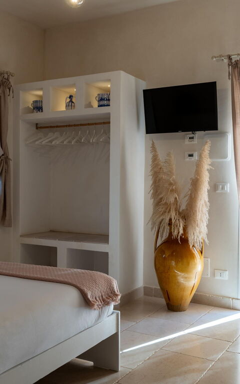 Villa Calanthia: chambre à coucher