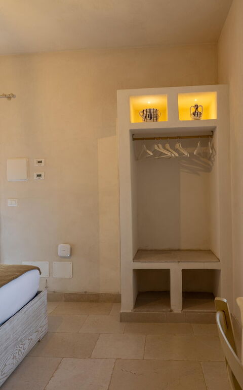 Villa Calanthia: chambre à coucher