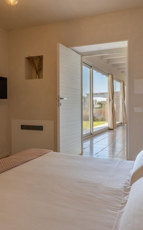 Villa Calanthia: chambre à coucher