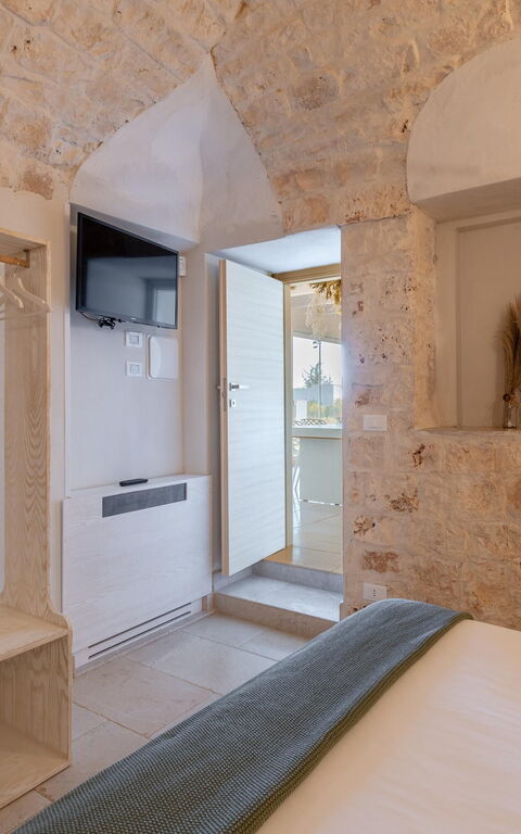 Villa Calanthia: chambre à coucher