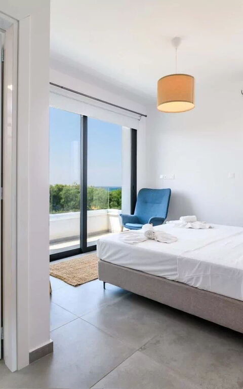 By the Beach - Blue Topaz Villa: chambre à coucher