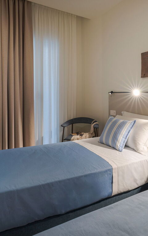 La Prua Apartament: chambre à coucher